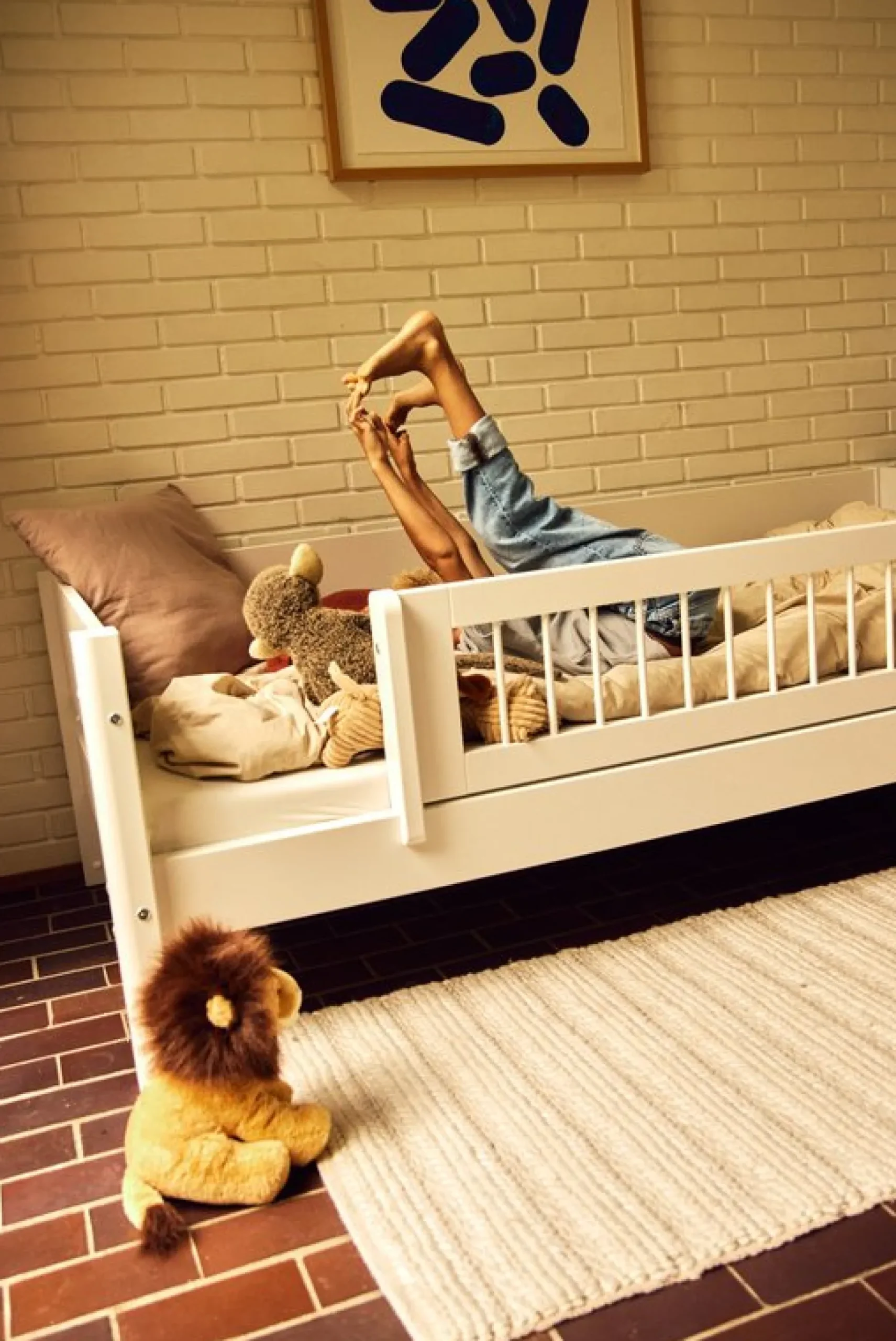 Einzelbett mit Absturzsicherung